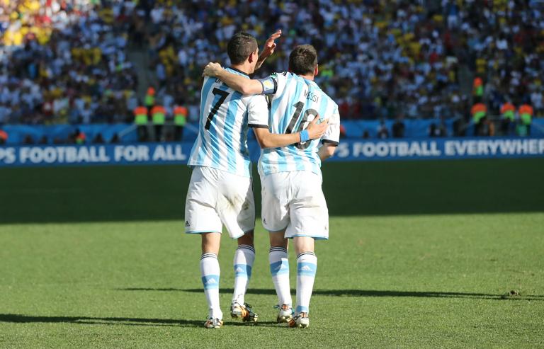 SAO PAULO, BRAZIL - JULY 01: Angel Di Maria of Argentina celebrates scoring with Lionel Messi of Argentina during the 2014 FIFA World Cup Brazil Round of 16 match between Argentina and Switzerland at The Arena de Sao Paulo on July 01, 2014 in Sao Paulo, Brazil. (Photo by Ian MacNicol/Getty Images)