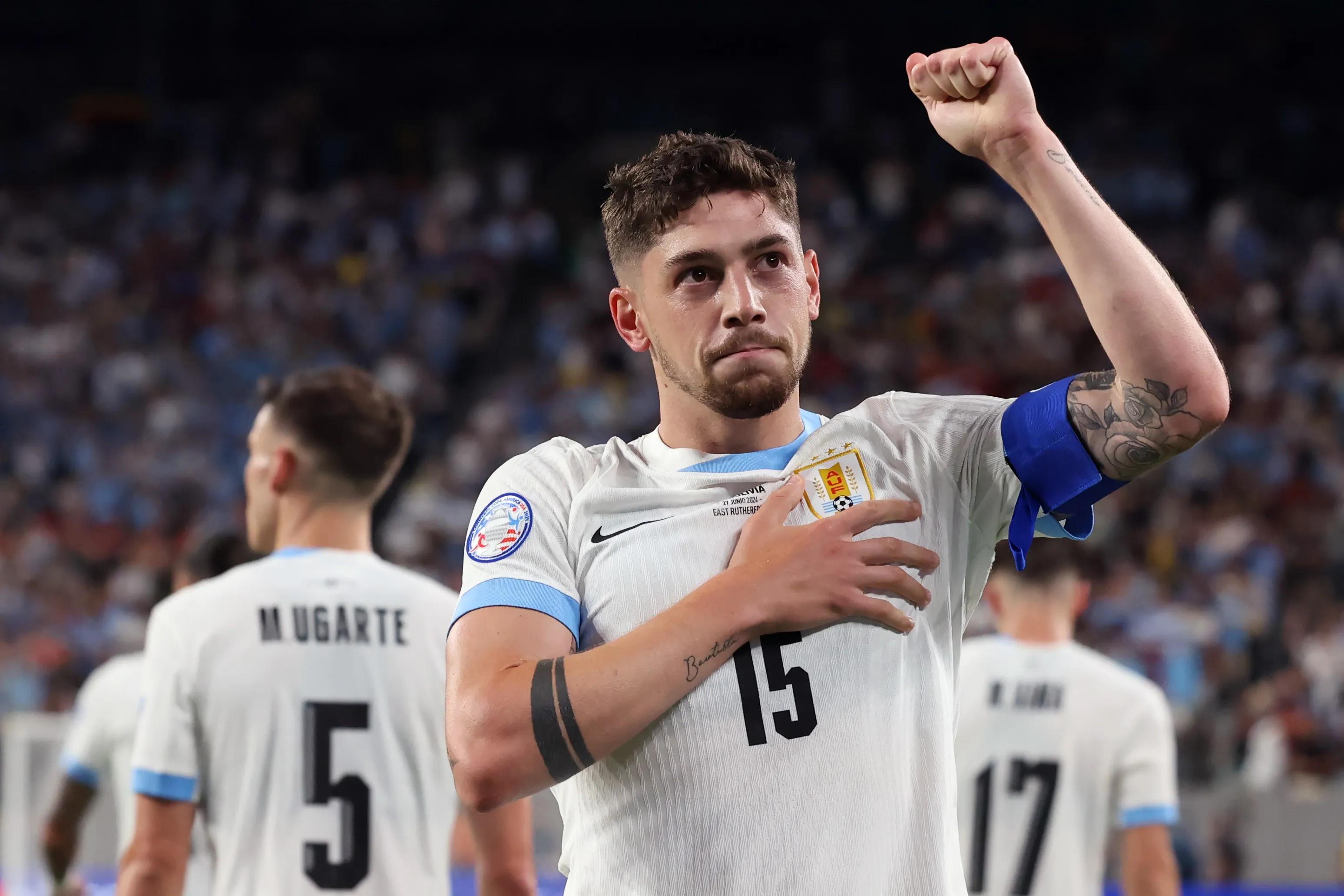Federico Valverde celebrates during a Copa América match EAST RUTHERFORD, NEW JERSEY - JUNE 27: Federico Valverde of Uruguay celebrates after scoring the team's fourth goal during the CONMEBOL Copa America 2024 Group C match between Uruguay and Bolivia at MetLife Stadium on June 27, 2024 in East Rutherford, New Jersey. (Photo by Ira L. Black - Corbis/Getty Images)