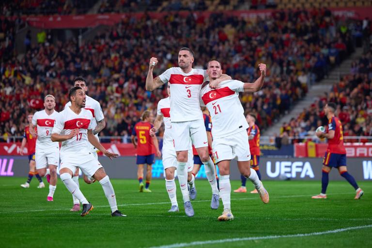 SEVILLE, SPAIN - NOVEMBER 18: Deniz Gul of Turkiye celebrates scoring his team's first goal with teammates during the FIFA World Cup 2026 qualifier match between Spain and Türkiye at Estadio de La Cartuja on November 18, 2025 in Seville, Spain. (Photo by Fran Santiago - UEFA/UEFA via Getty Images)